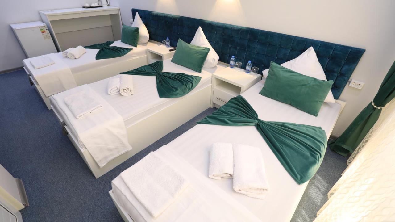 Sharq Hotel Ourguentch Extérieur photo