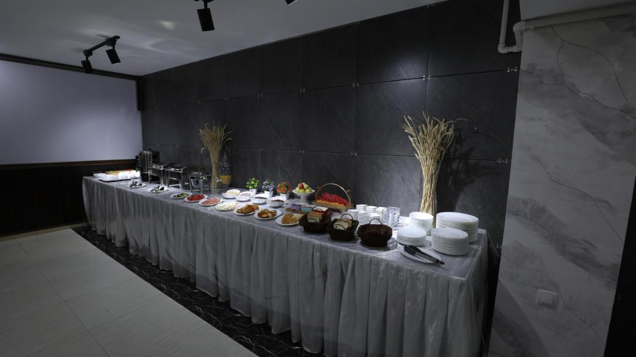 Sharq Hotel Ourguentch Extérieur photo